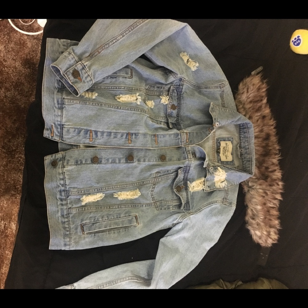 Distressed denim jacket